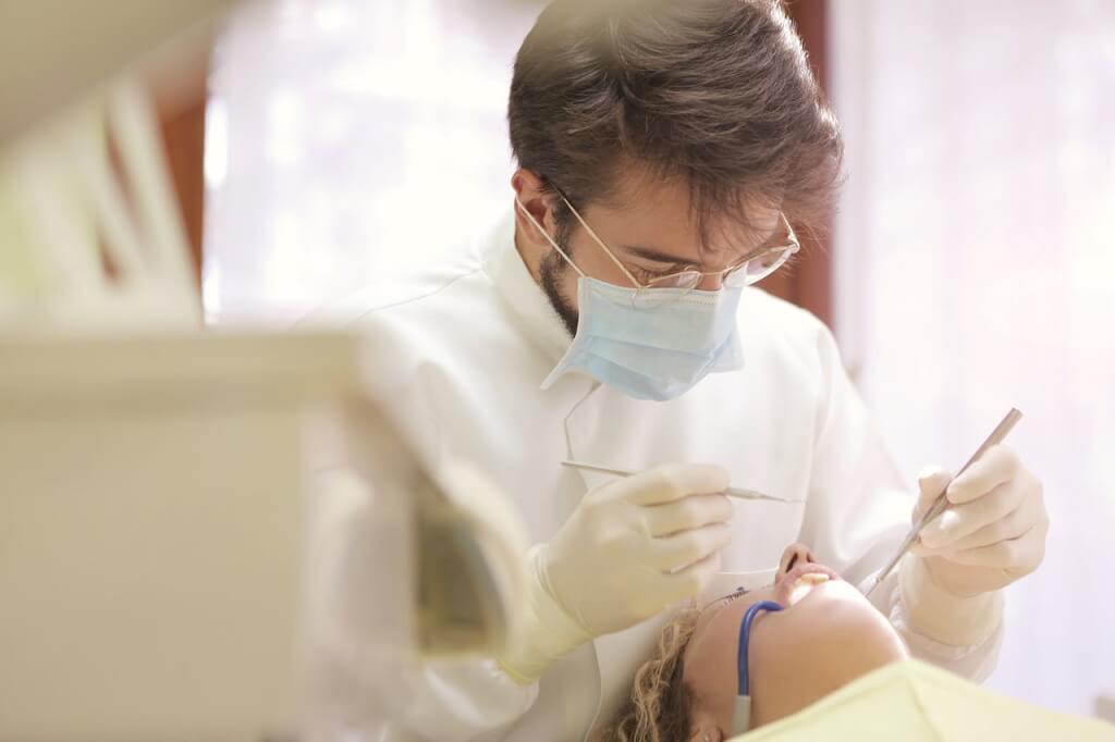 Why don't patients negotiate the price of dental treatment in the UK?